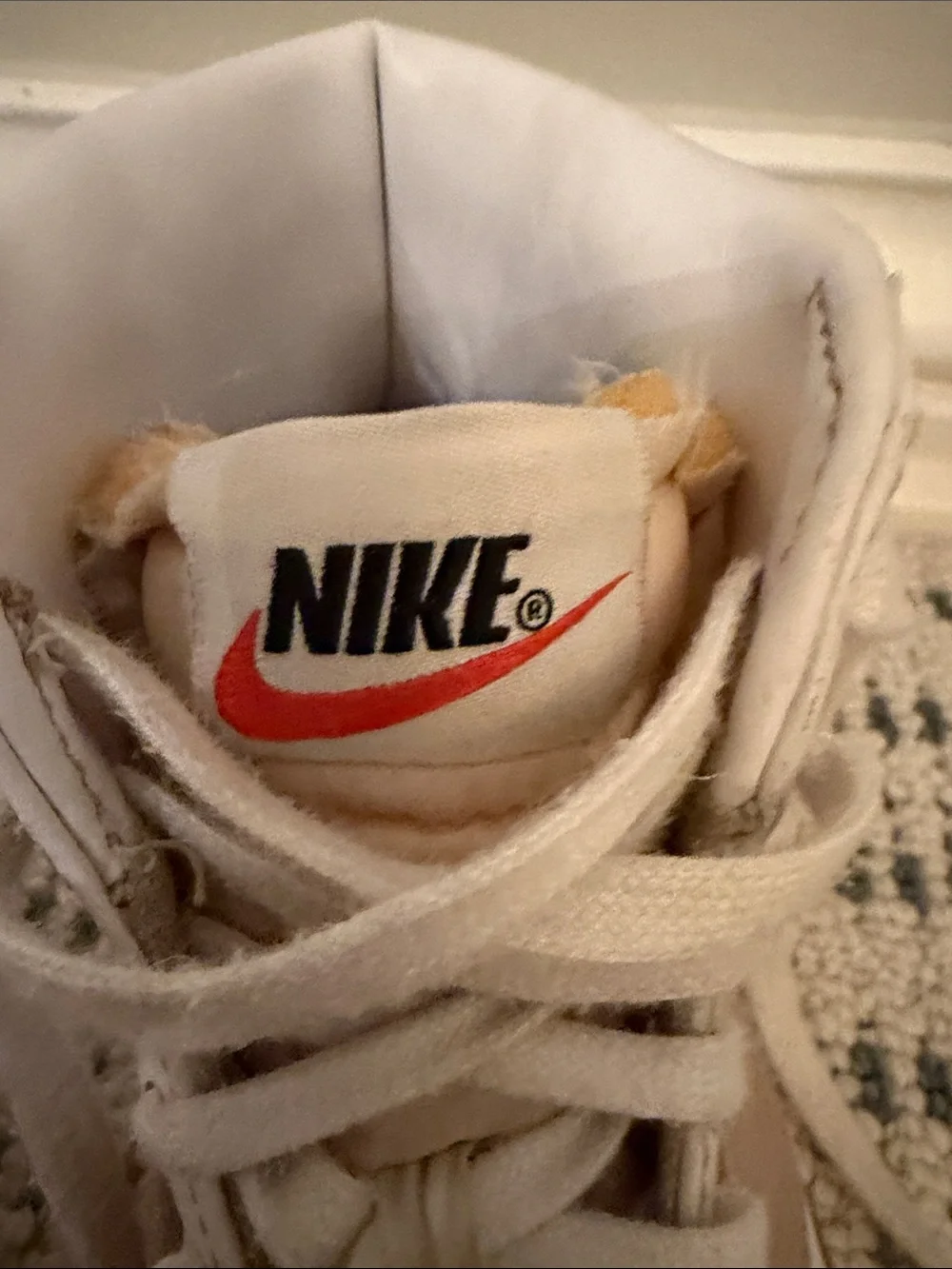 Nike Women's White High-Top Sneakers with Tan Swoosh
